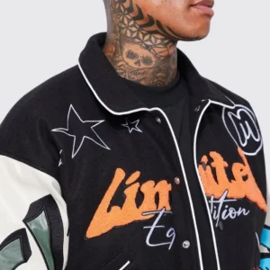 black boxy fit graffiti varsity jacket patched