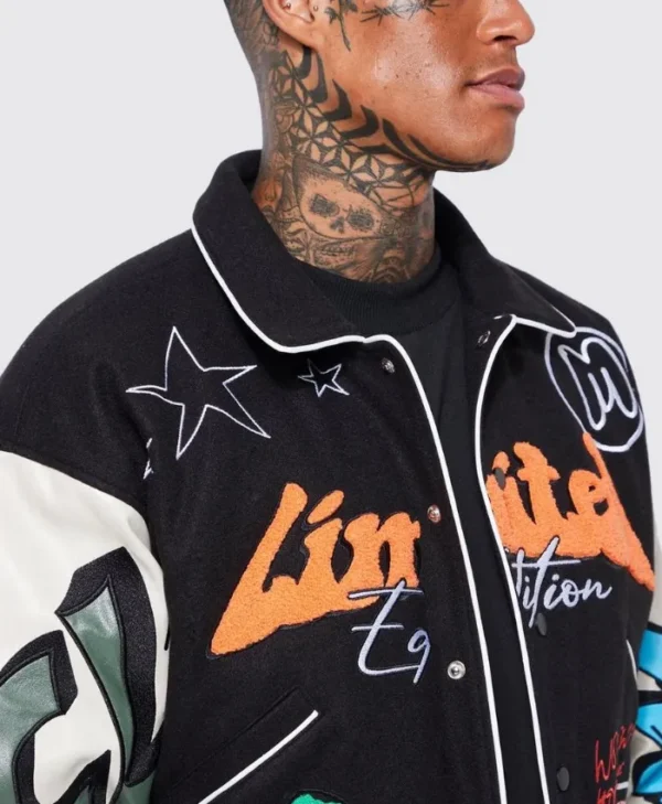 black boxy fit graffiti varsity jacket patched