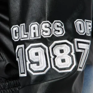 womens blue cropped class of 87 varsity jacket logo