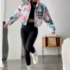 womens boxy fit puffer graffiti varsity jacket walk