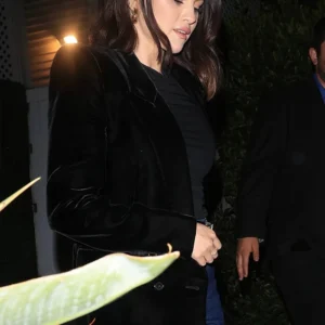 slick in a black blazer Front