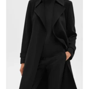Judy Reyes High Potential Black Coat