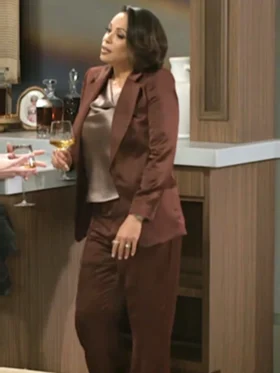 Beyond the Gates S01 Daphnee Duplaix Brown Suit Side