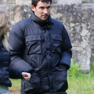 Wake Up Dead Man Josh O’Connor Puffer Jacket Side