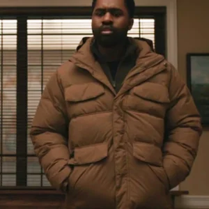 Elsbeth S02 Joshua Echebiri Brown Puffer Jacket Side