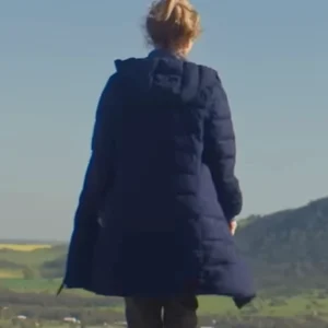 The Travellers 2025 Susie Porter Blue Puffer Coat