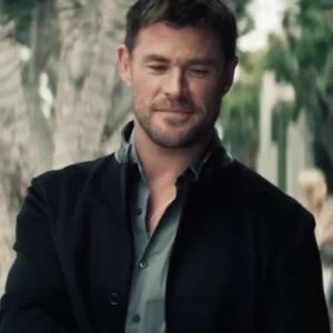 Crime 101 Chris Hemsworth Black Coat Side