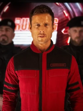 The Running Man Glen Powell Red Jacket Side
