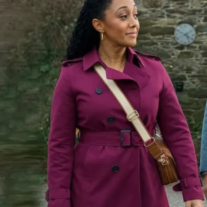 Haunted Harmony Mysteries Buried at C Tamera Mowry-Housley Purple Coat Side