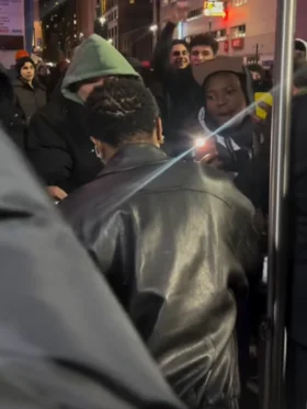 Wizkid at the New York Knicks basketball game jacket