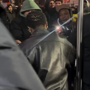 Wizkid at the New York Knicks basketball game jacket