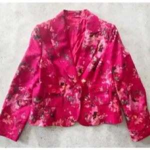 Buy Justina Machado TV Series Matlock S02 Eva Munoz Pink Silk Floral Blazer For Women