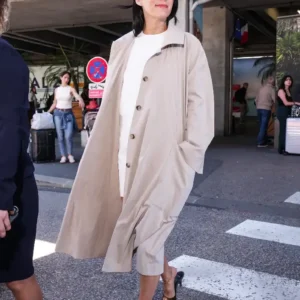 Shop Riley Keough Arriving Nice Airport 79th Cannes Film Festival France 2026 Beige Trench Coat