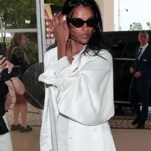 Simone Ashley Arriving Nice Airport 2026 France 79th Cannes Film Festival White Trench Coat